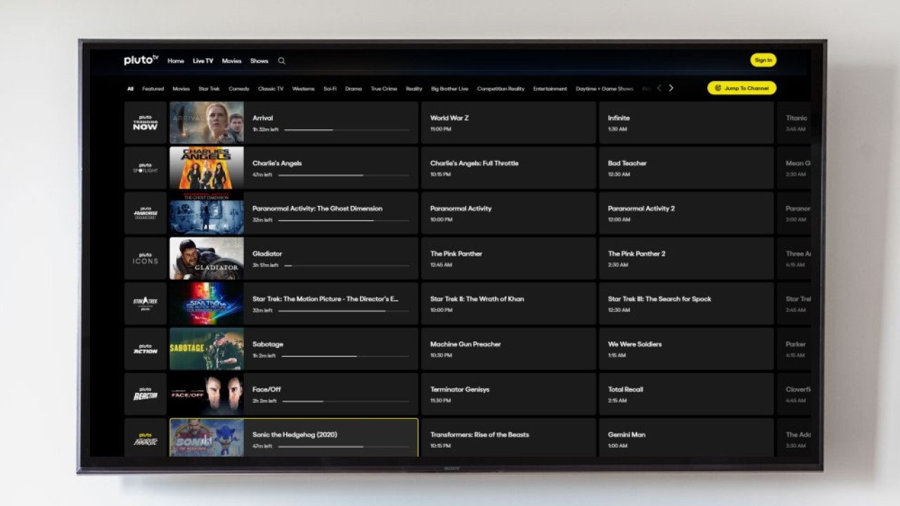 The Pluto TV channel guide, showing rows of always-on channels